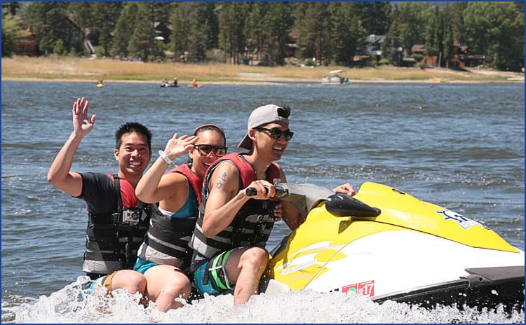 Three riders on a Waverunner out on Big Bear Lake